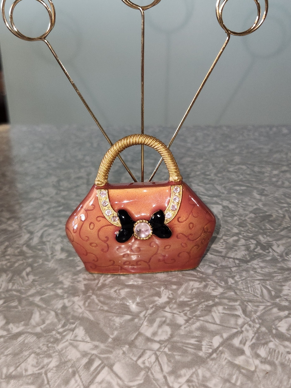 Metallic Peach Mini Handbag Charm with Gold Handle and Black Bow